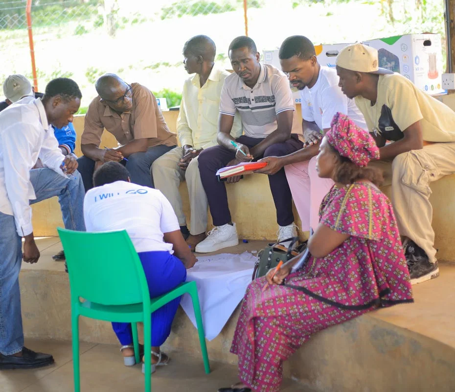 Participants working together in a small group